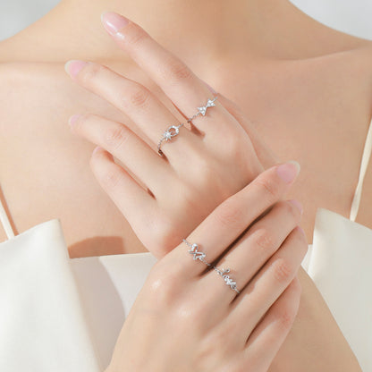 Bow open chain ring with stretchable tail ring