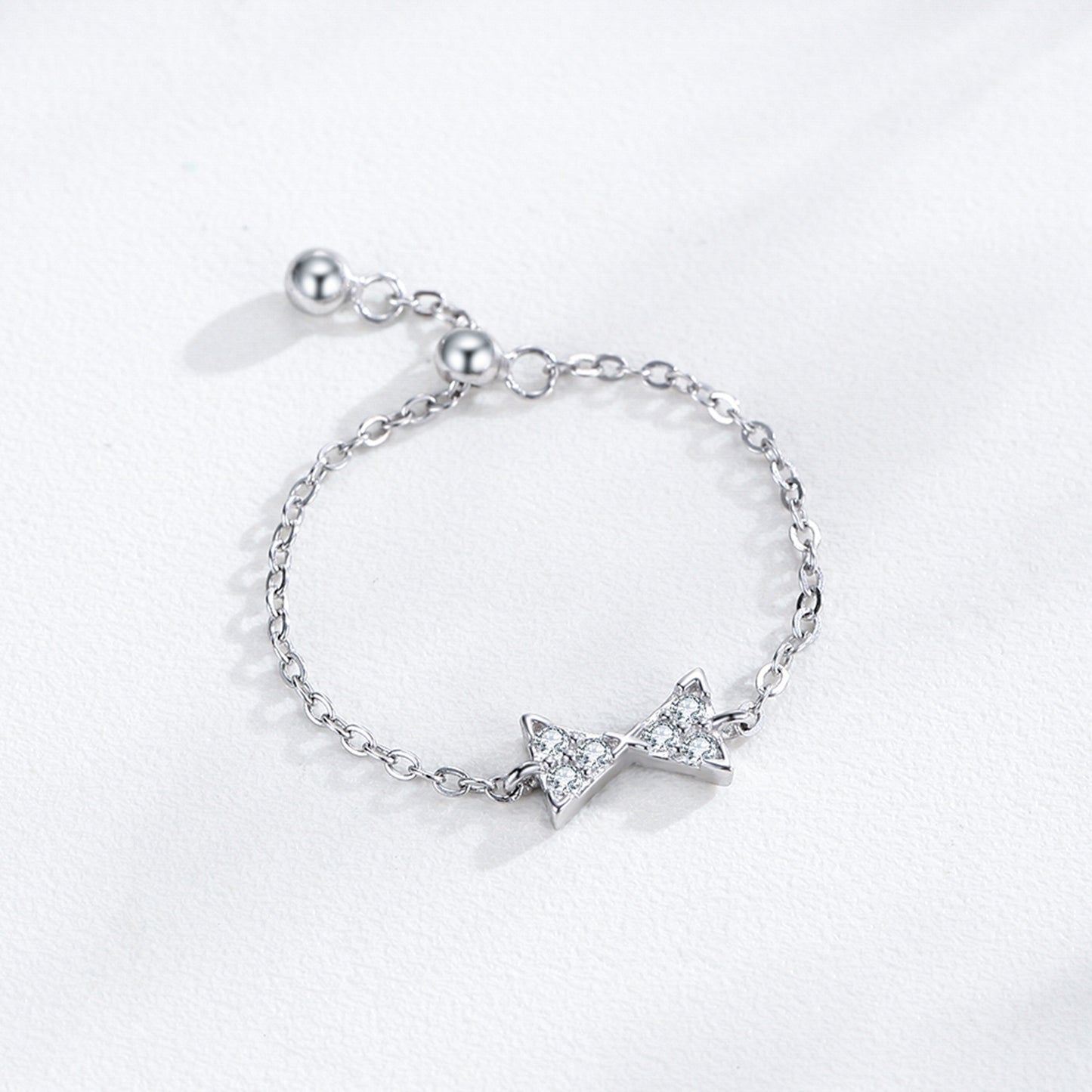 Bow open chain ring with stretchable tail ring