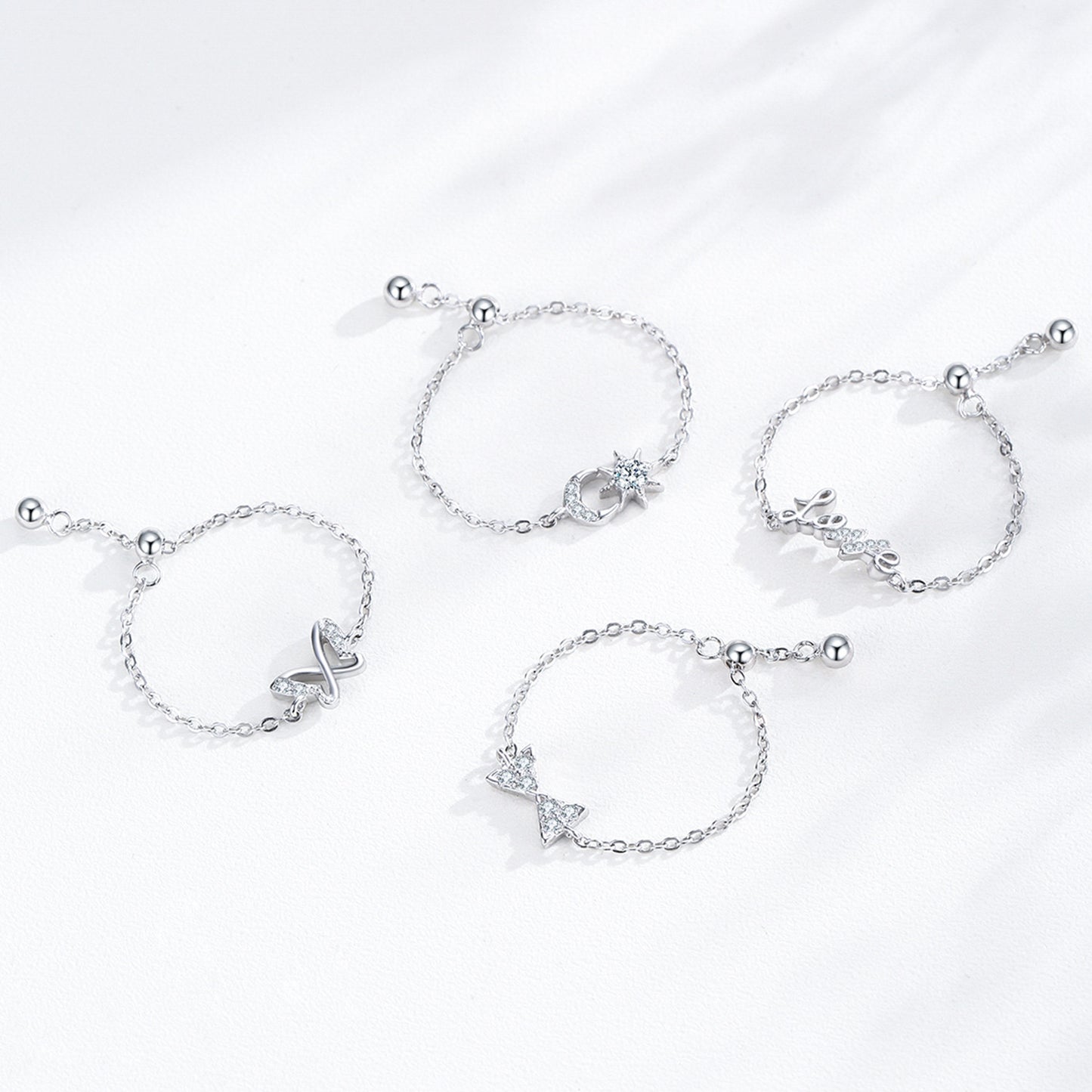 Bow open chain ring with stretchable tail ring