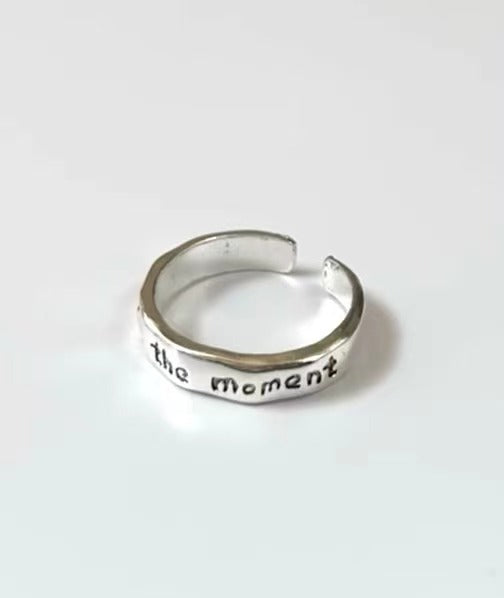'Live in the moment' Rings
